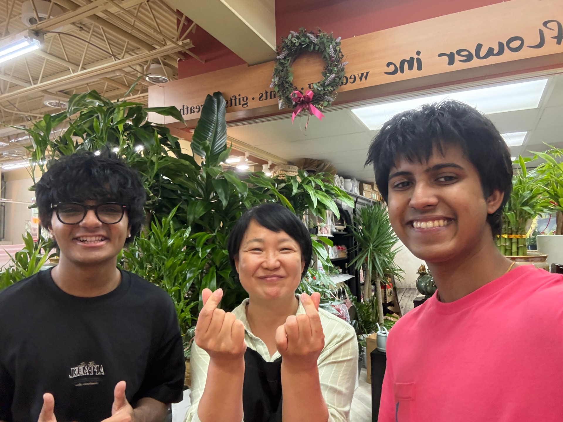 The TableSide team with the owners inside Awesome Flowers GA