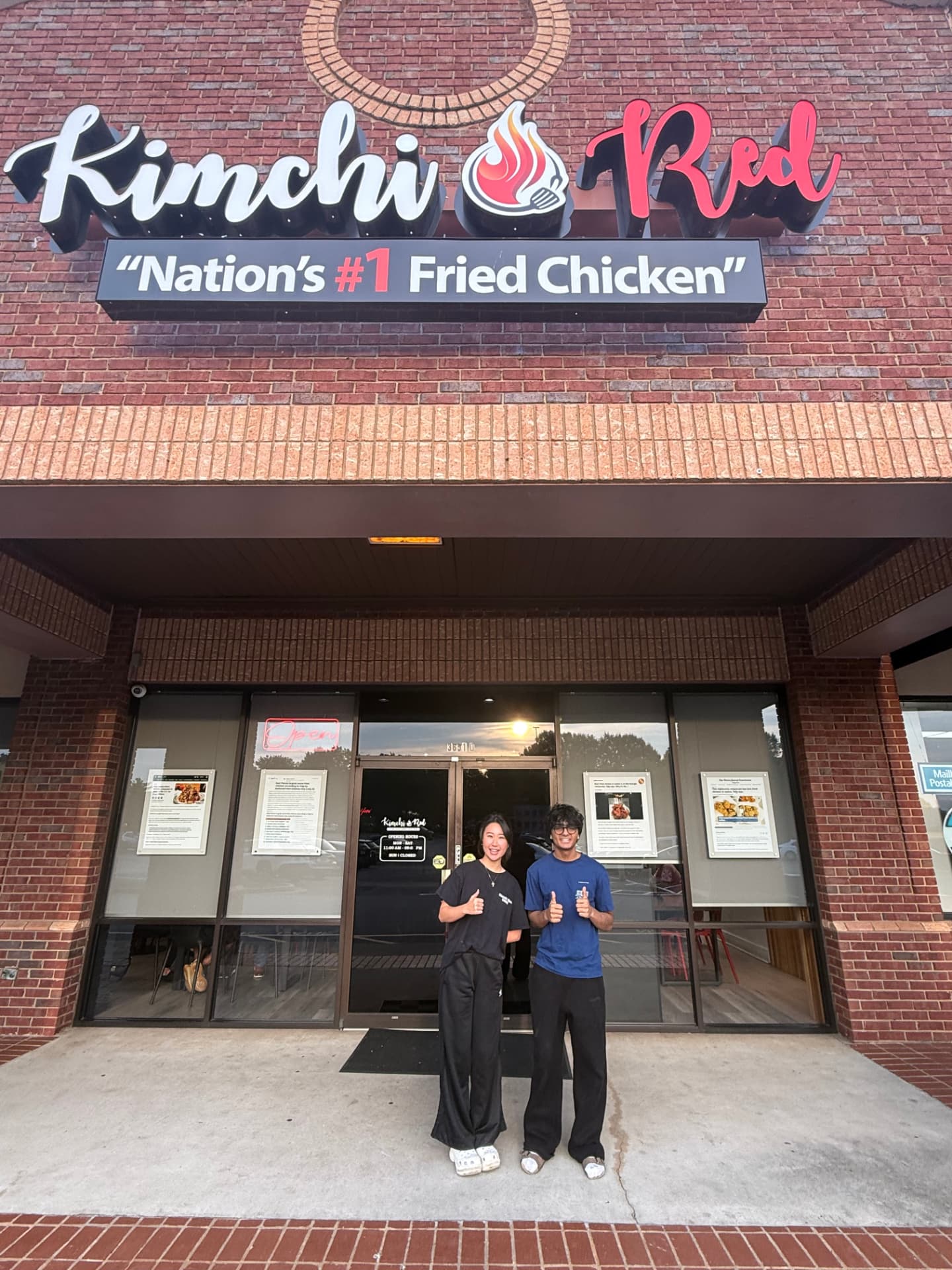 The TableSide team with the owner of Kimchi Red outside their Alpharetta storefront